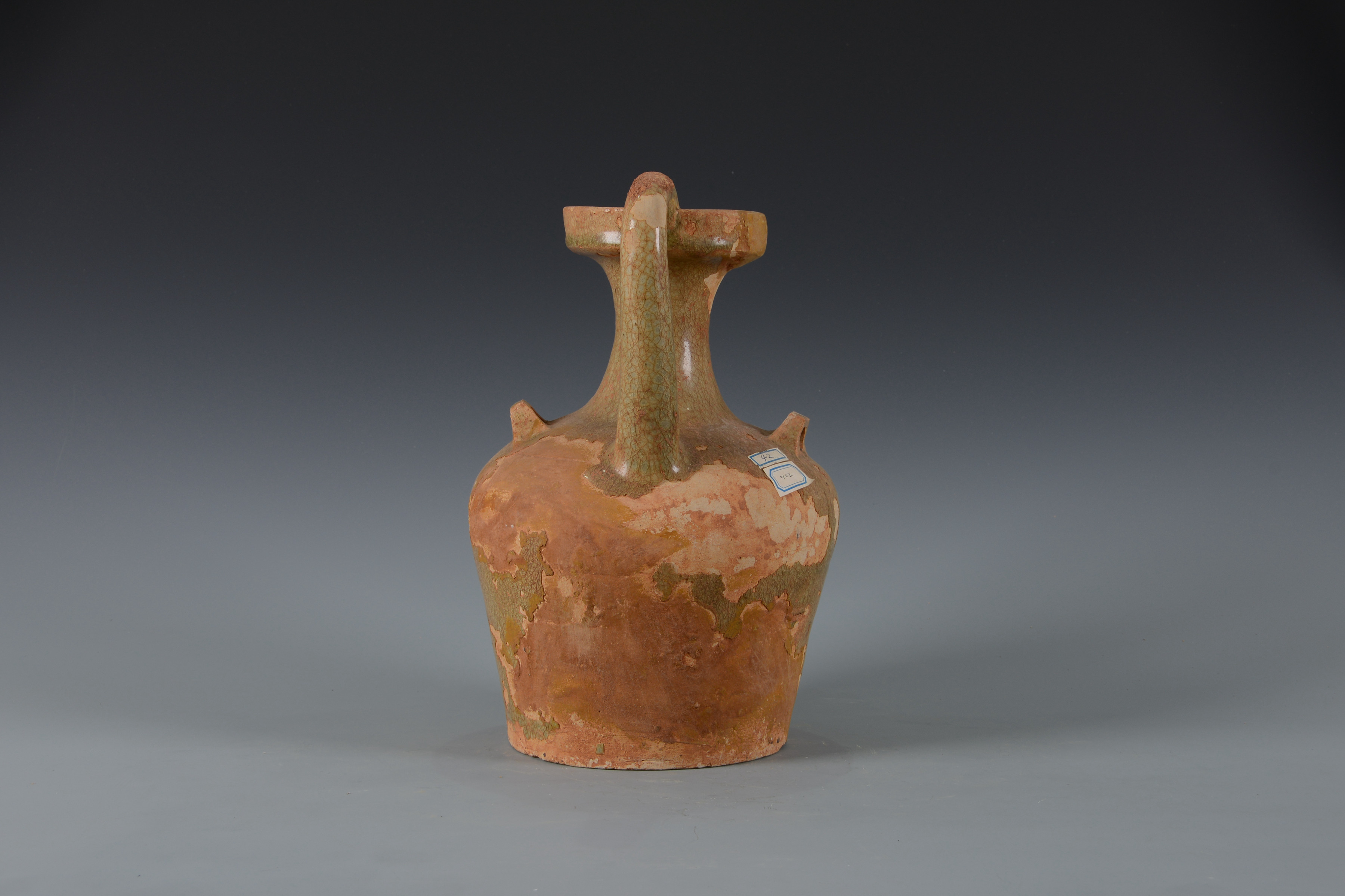 南朝青釉雙系雞首盤口陶壺