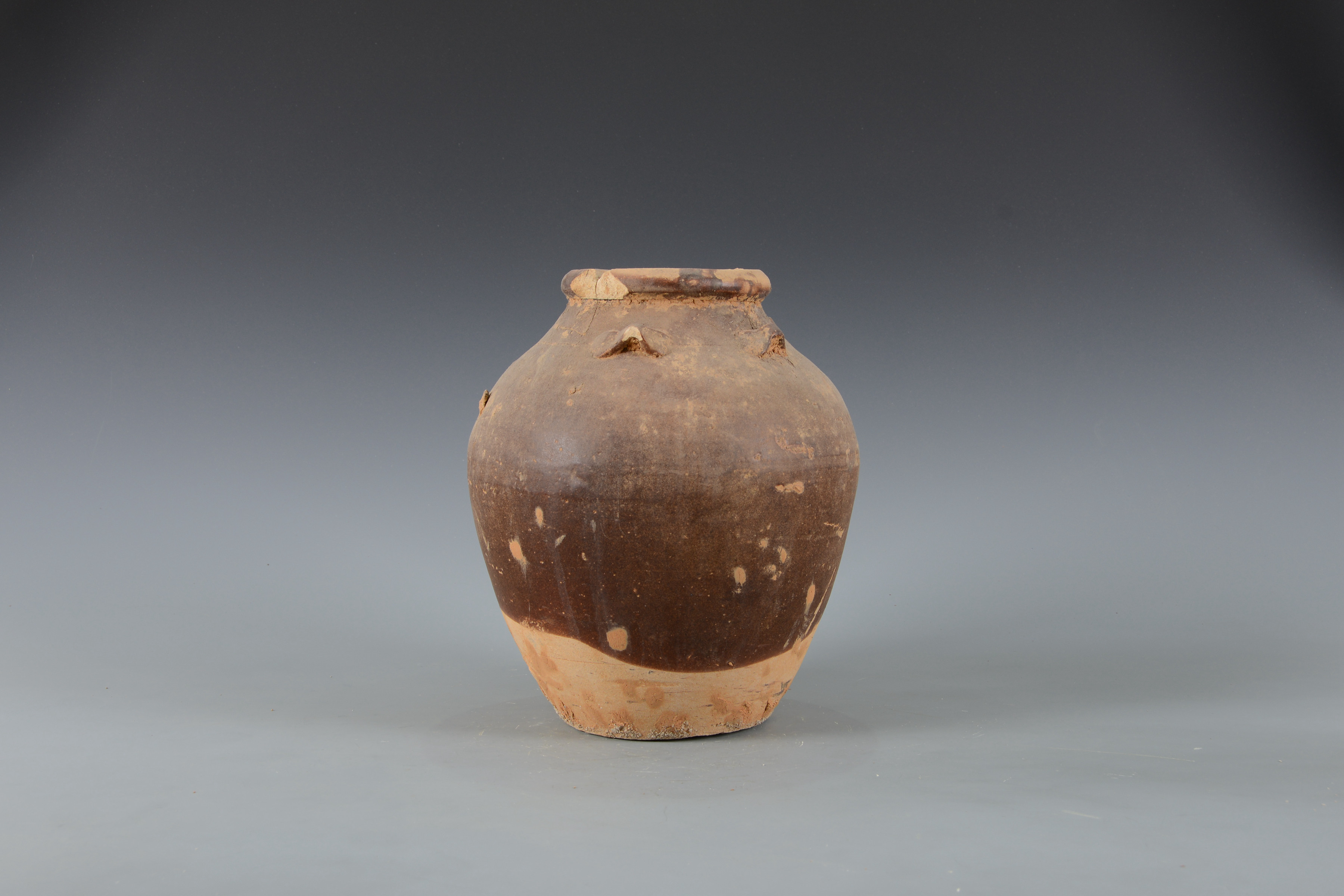 明褐釉四系陶罐