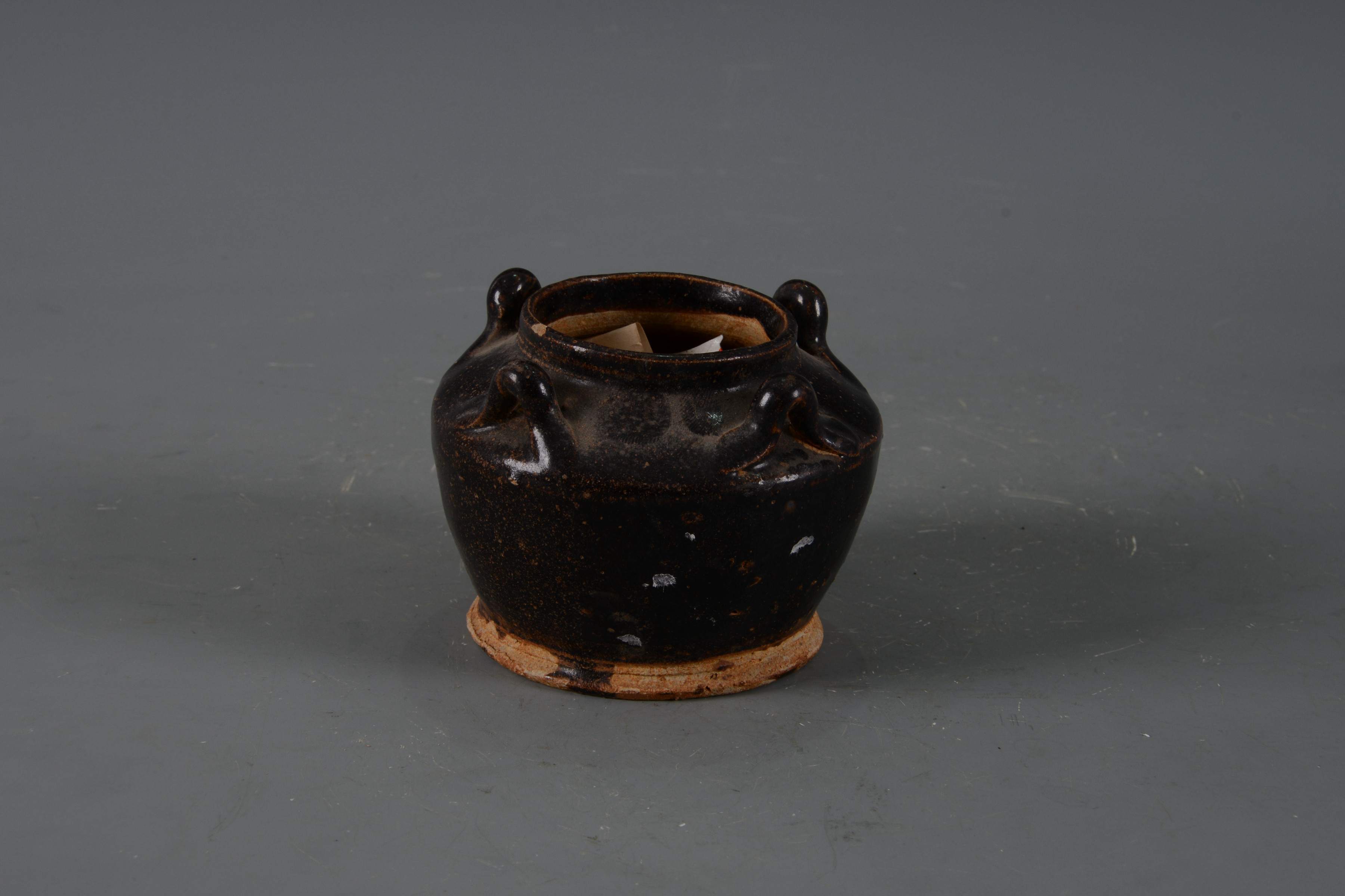 明黑釉四系陶罐