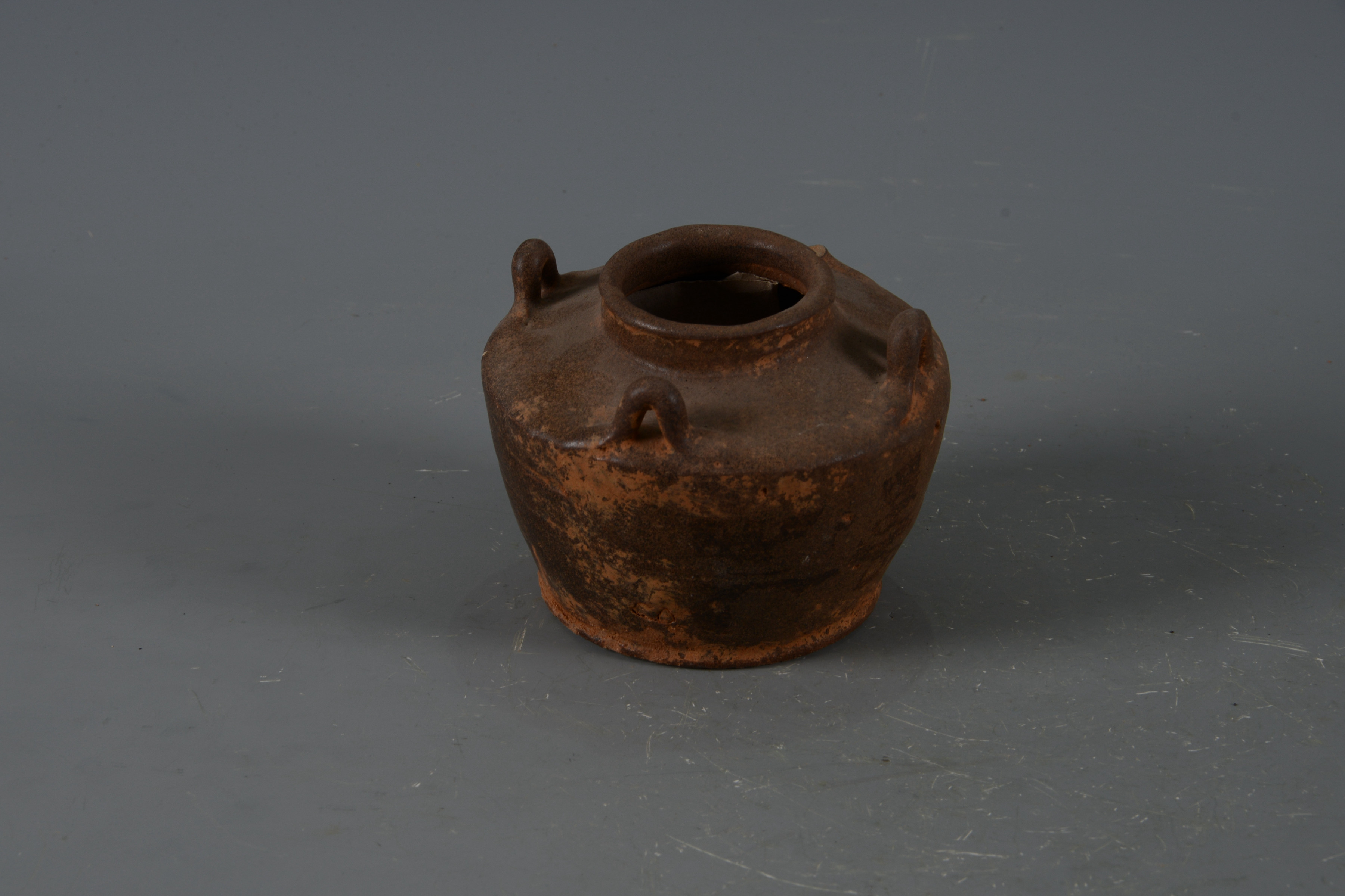 明褐釉四系陶罐