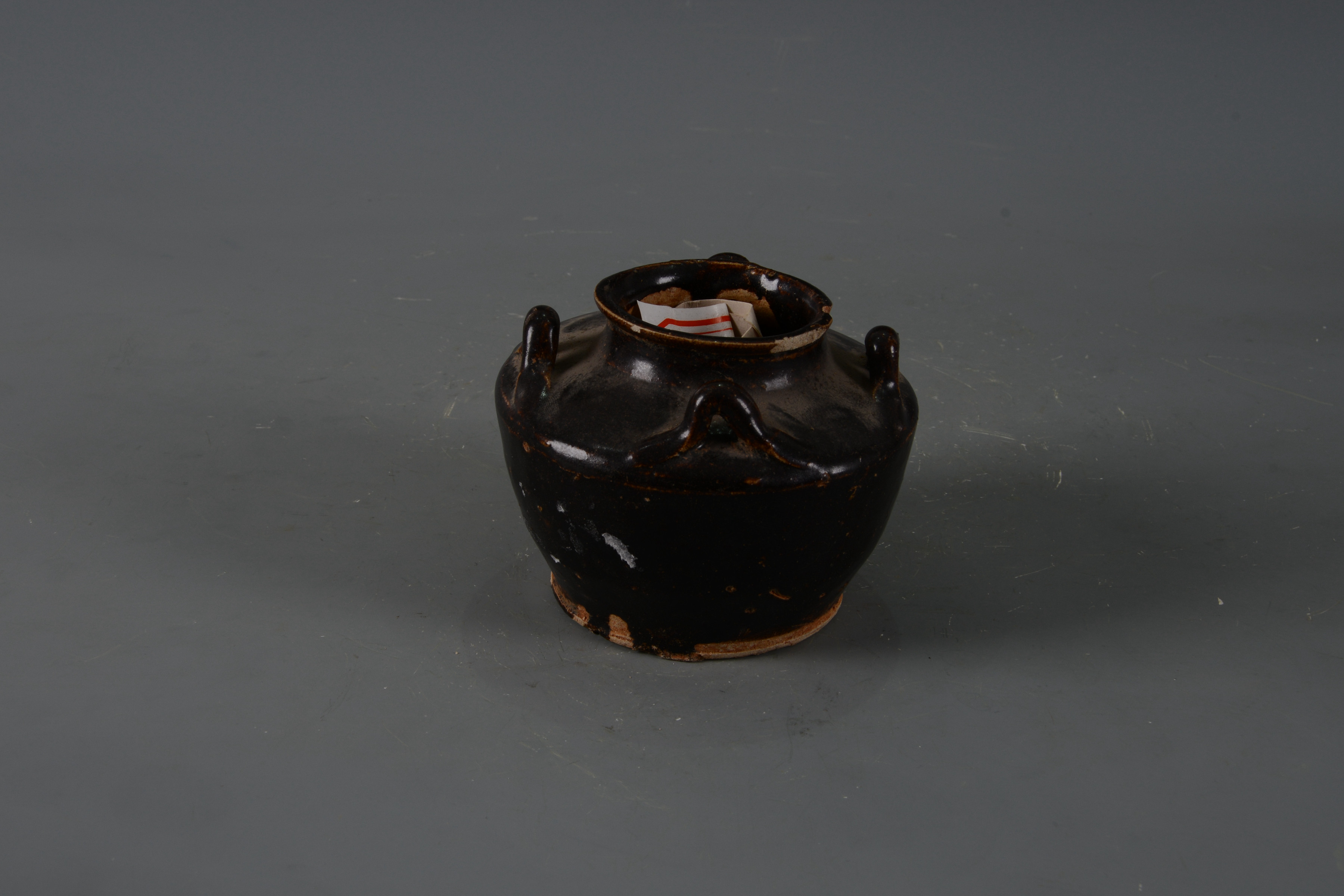 明黑釉四系陶罐