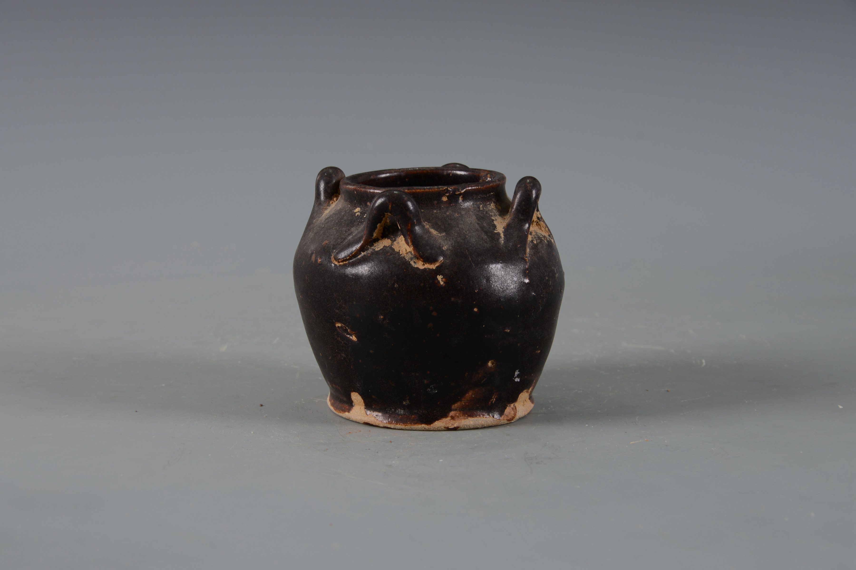 明黑釉四系陶罐