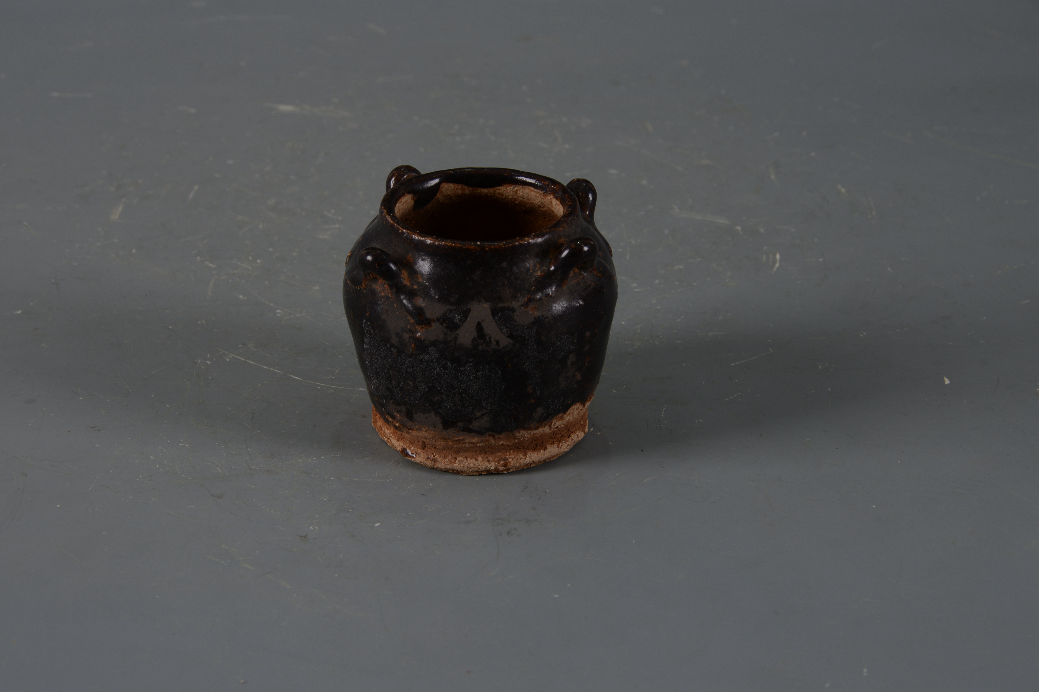 明黑釉四系陶罐