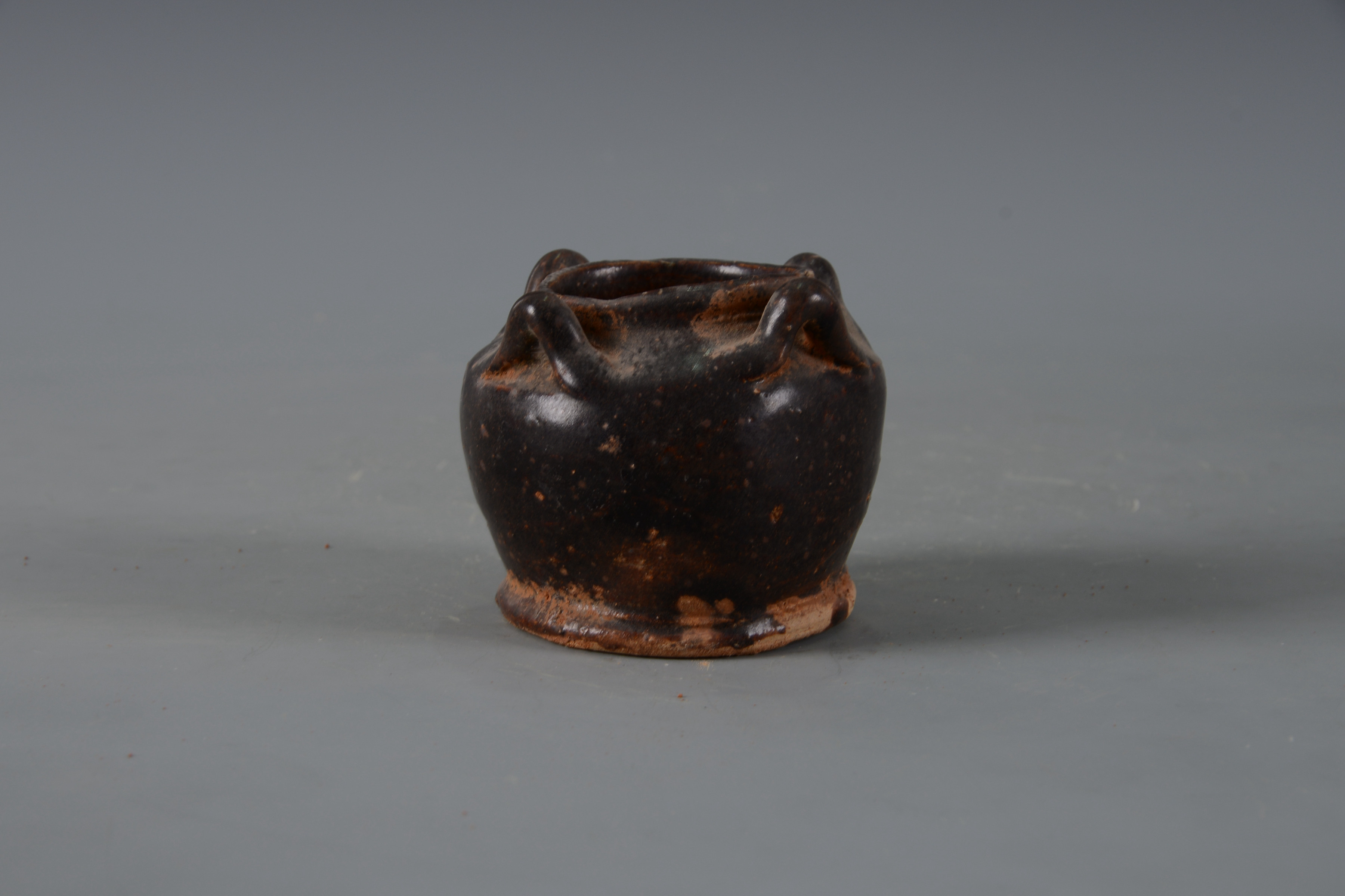 明黑釉四系陶罐