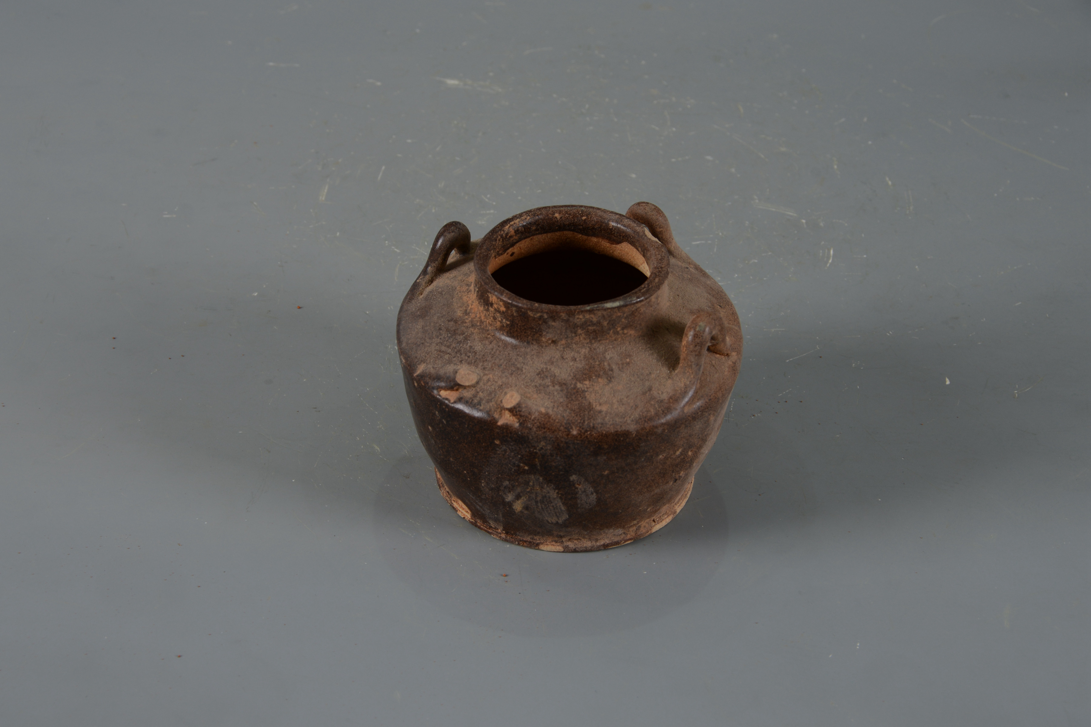 明黑釉四系陶罐