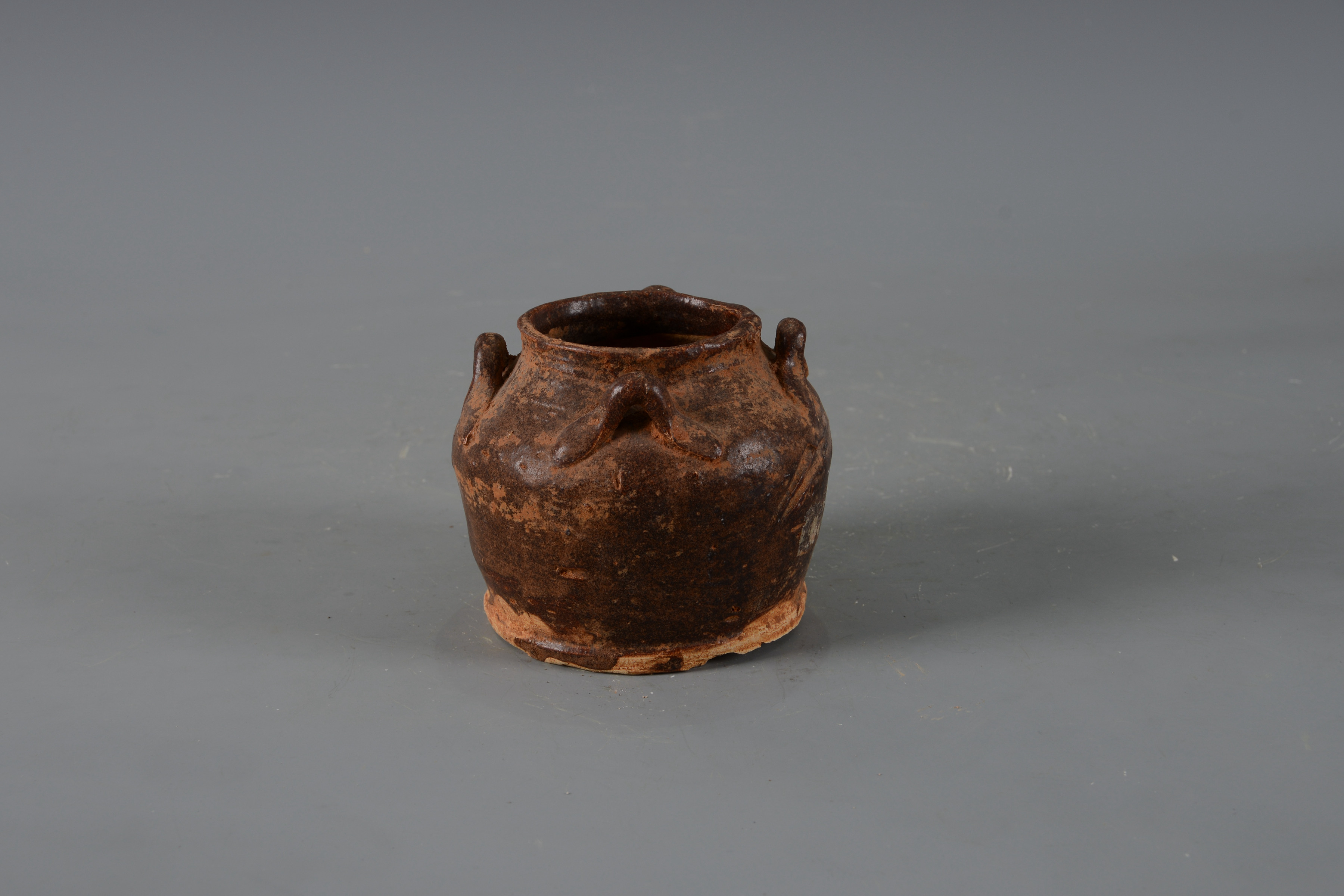 明褐釉四系陶罐