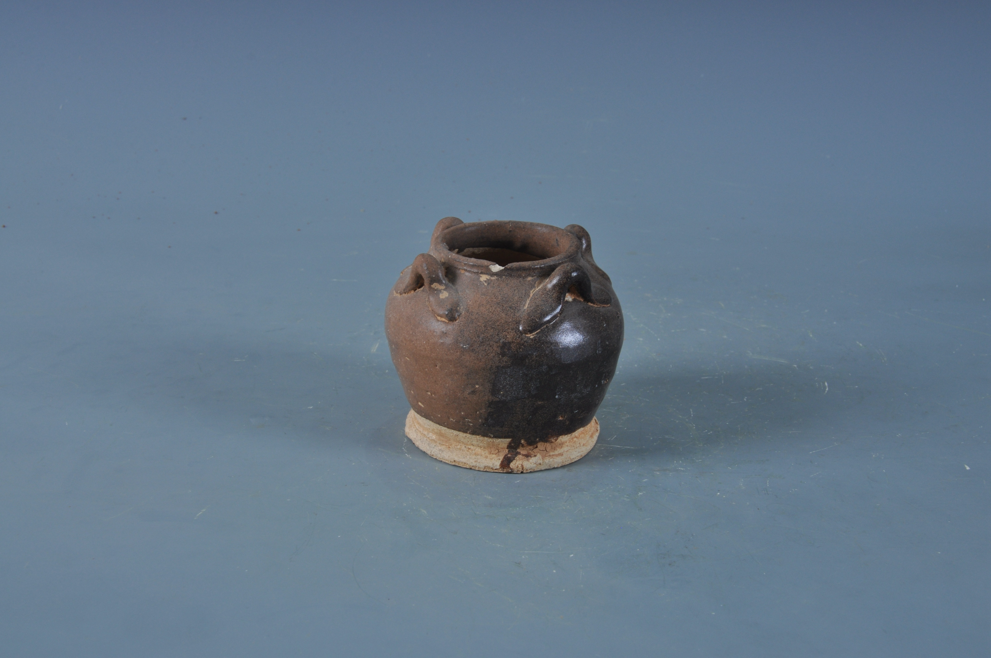 明黑釉四系陶罐