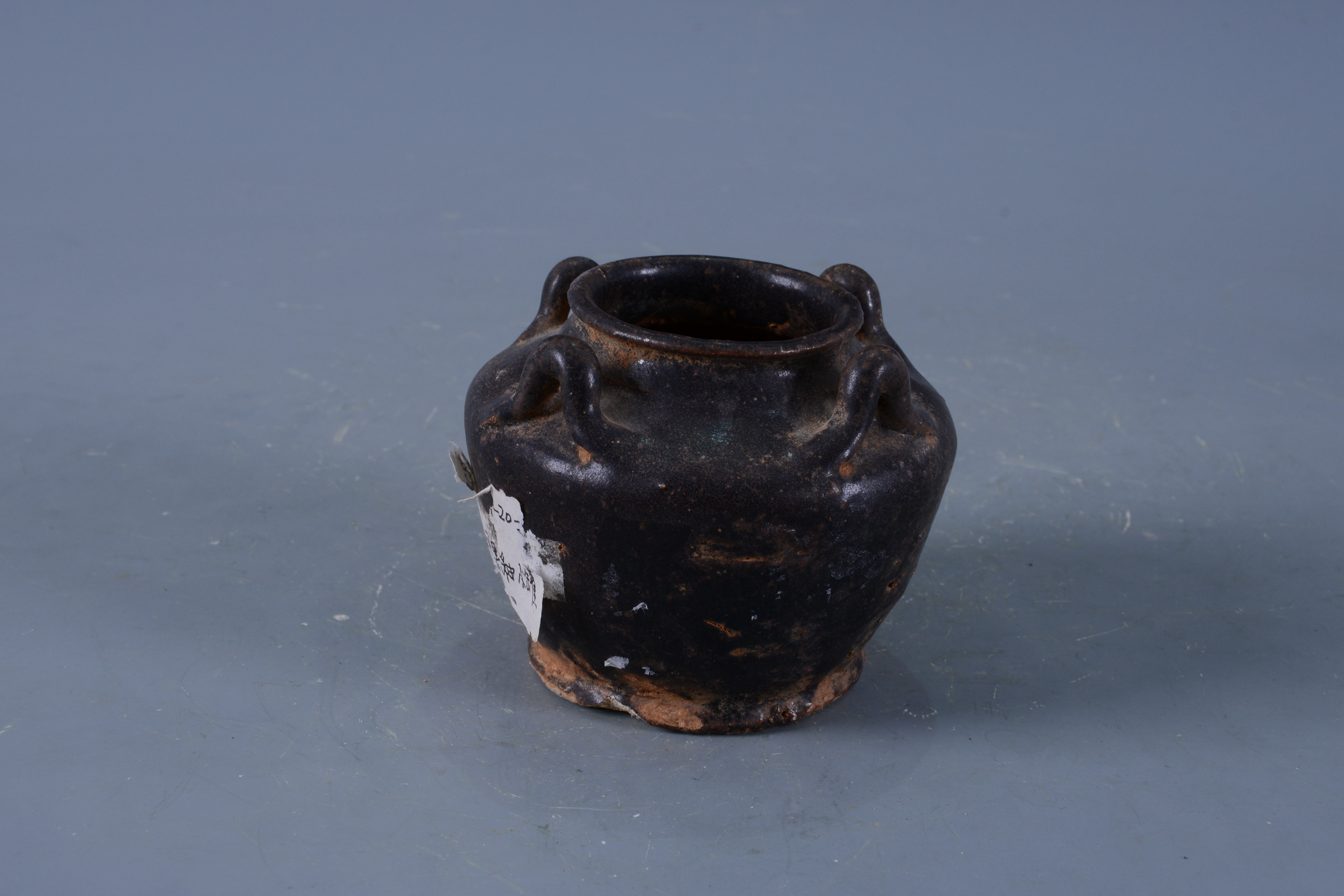 明黑釉四系陶罐