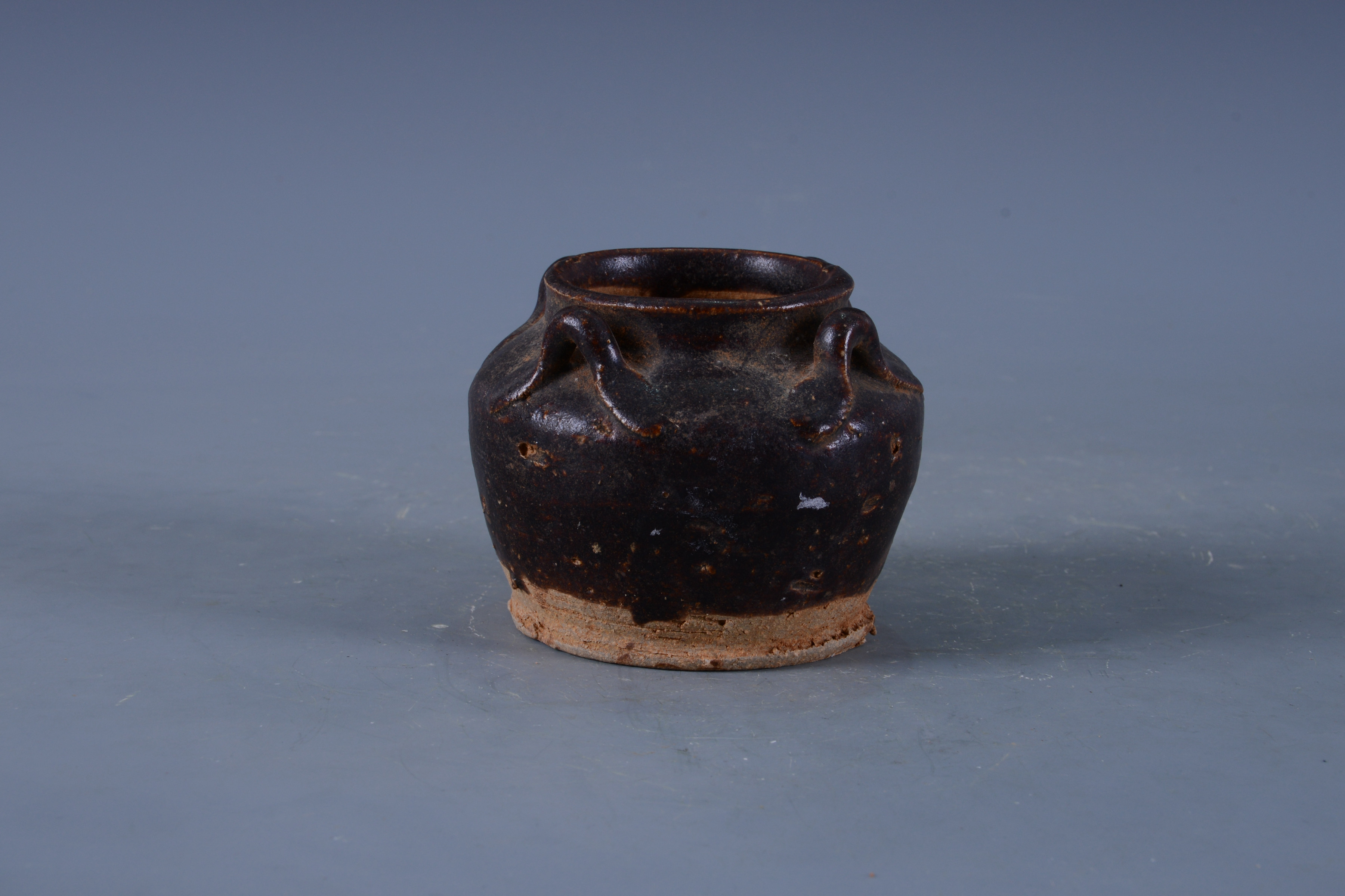 明褐釉四系陶罐