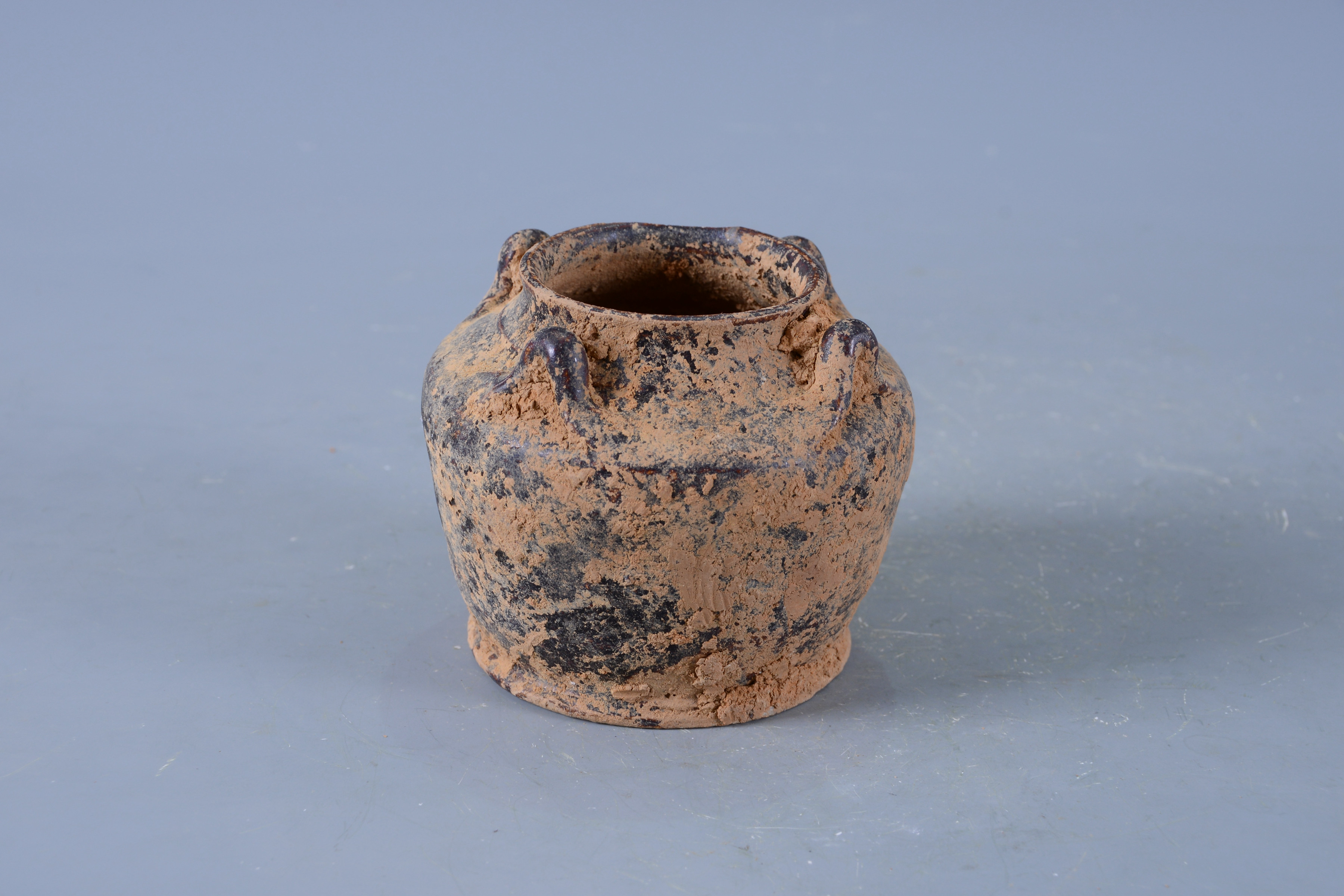 明褐釉四系陶罐