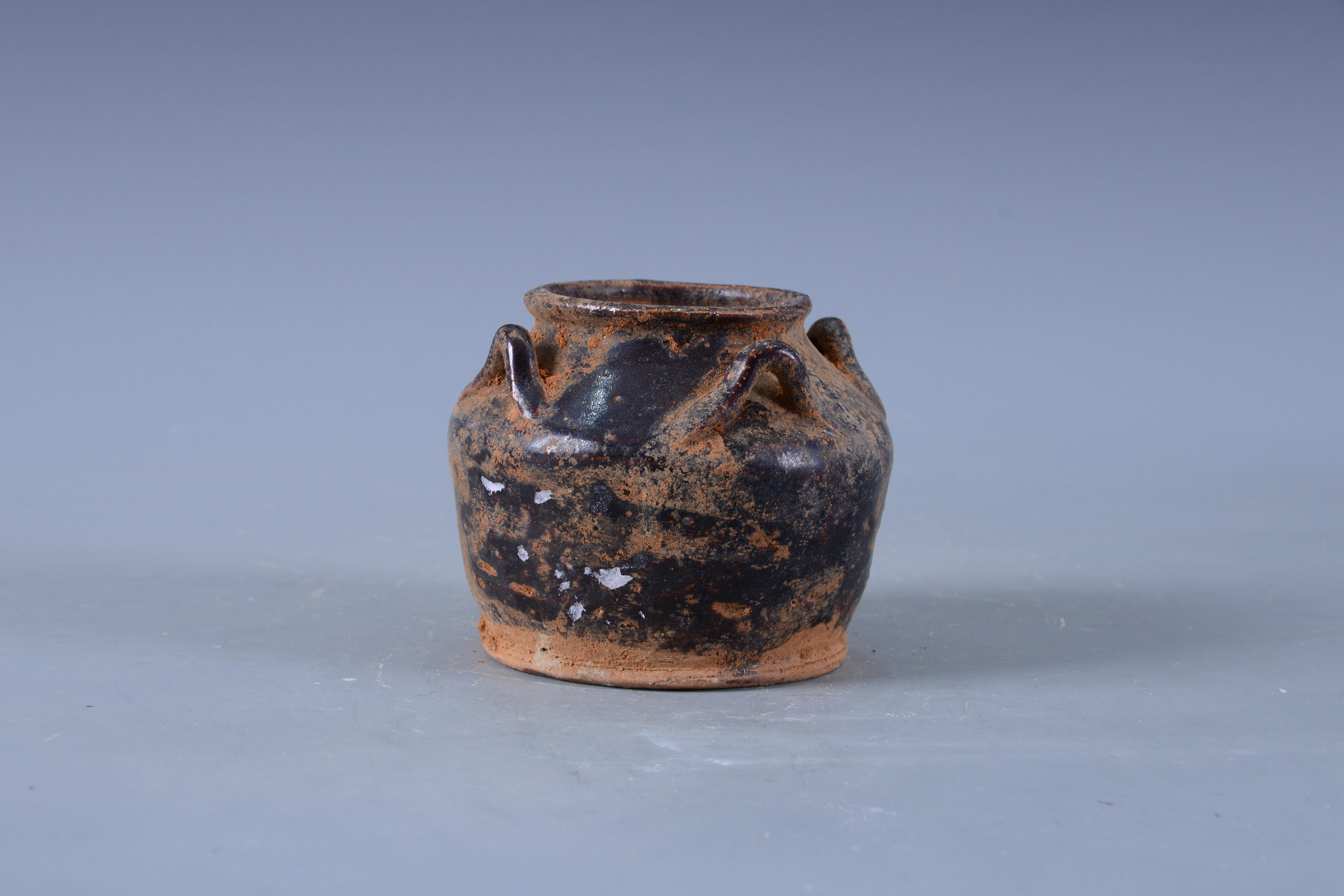 明褐釉四系陶罐