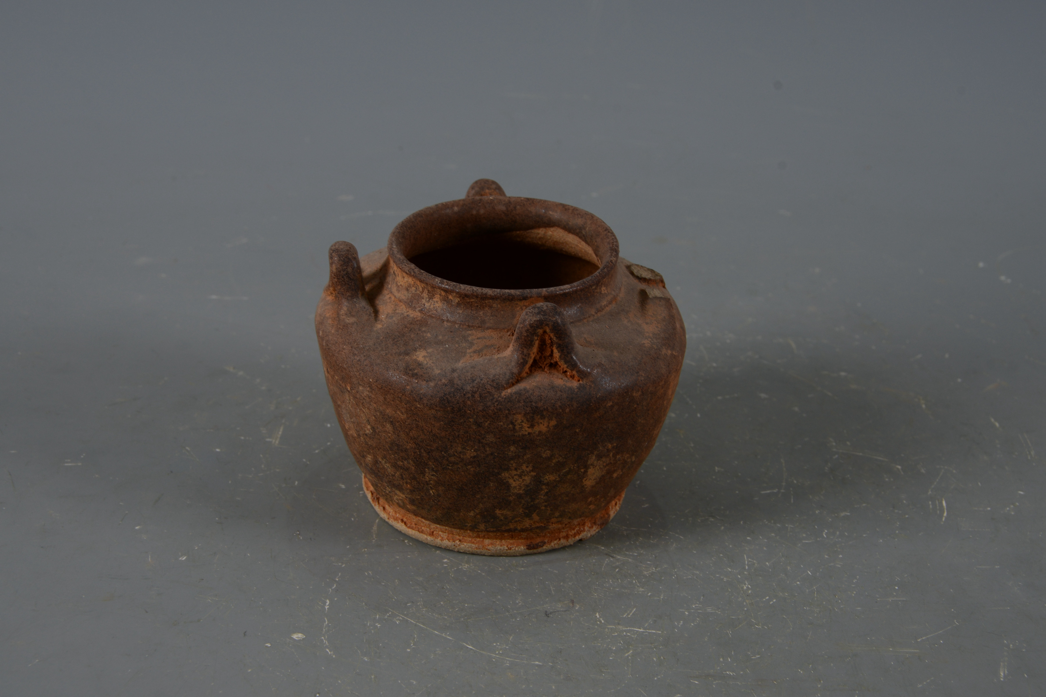 明褐釉四系陶罐