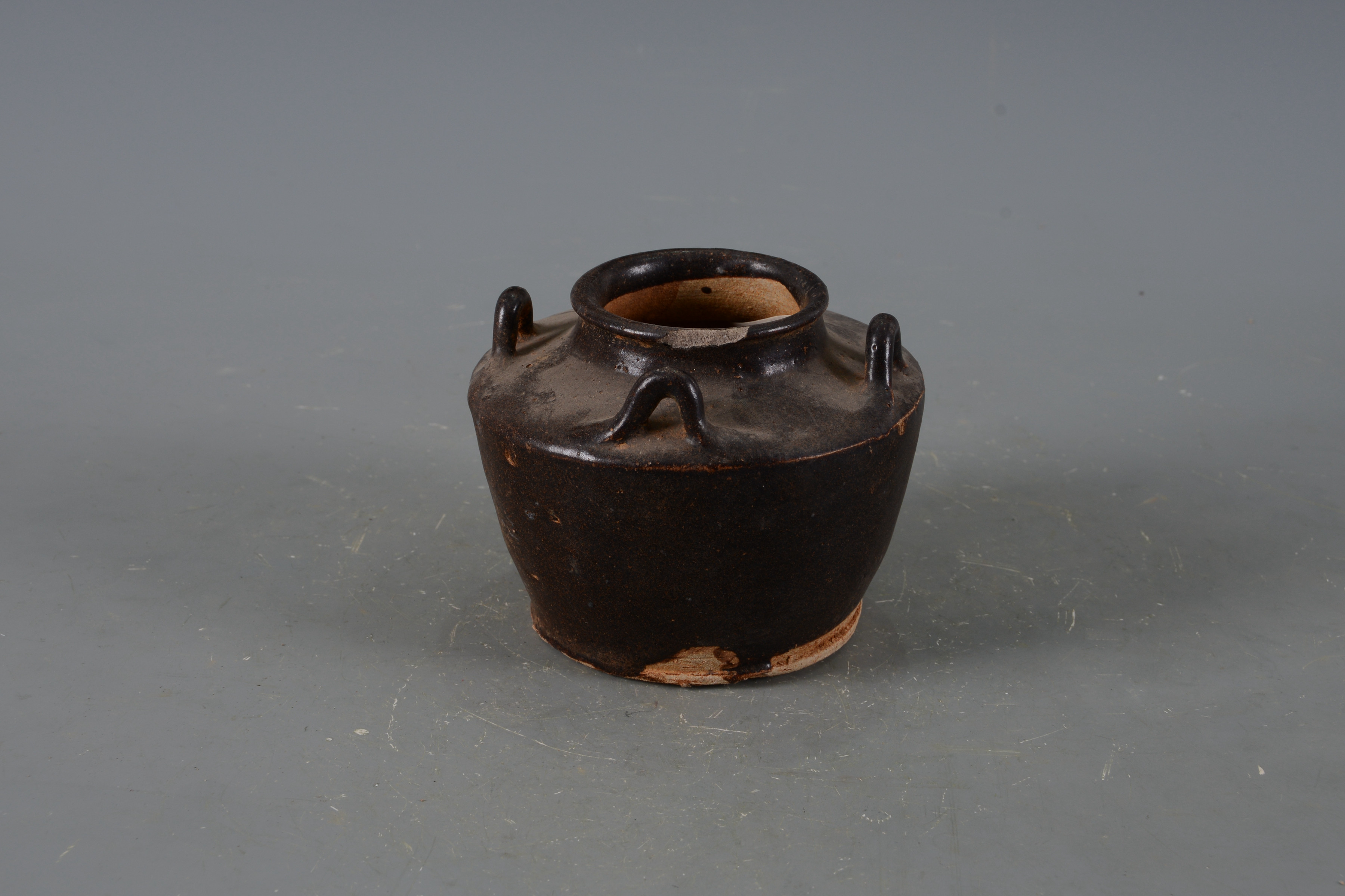 明褐釉四系陶罐